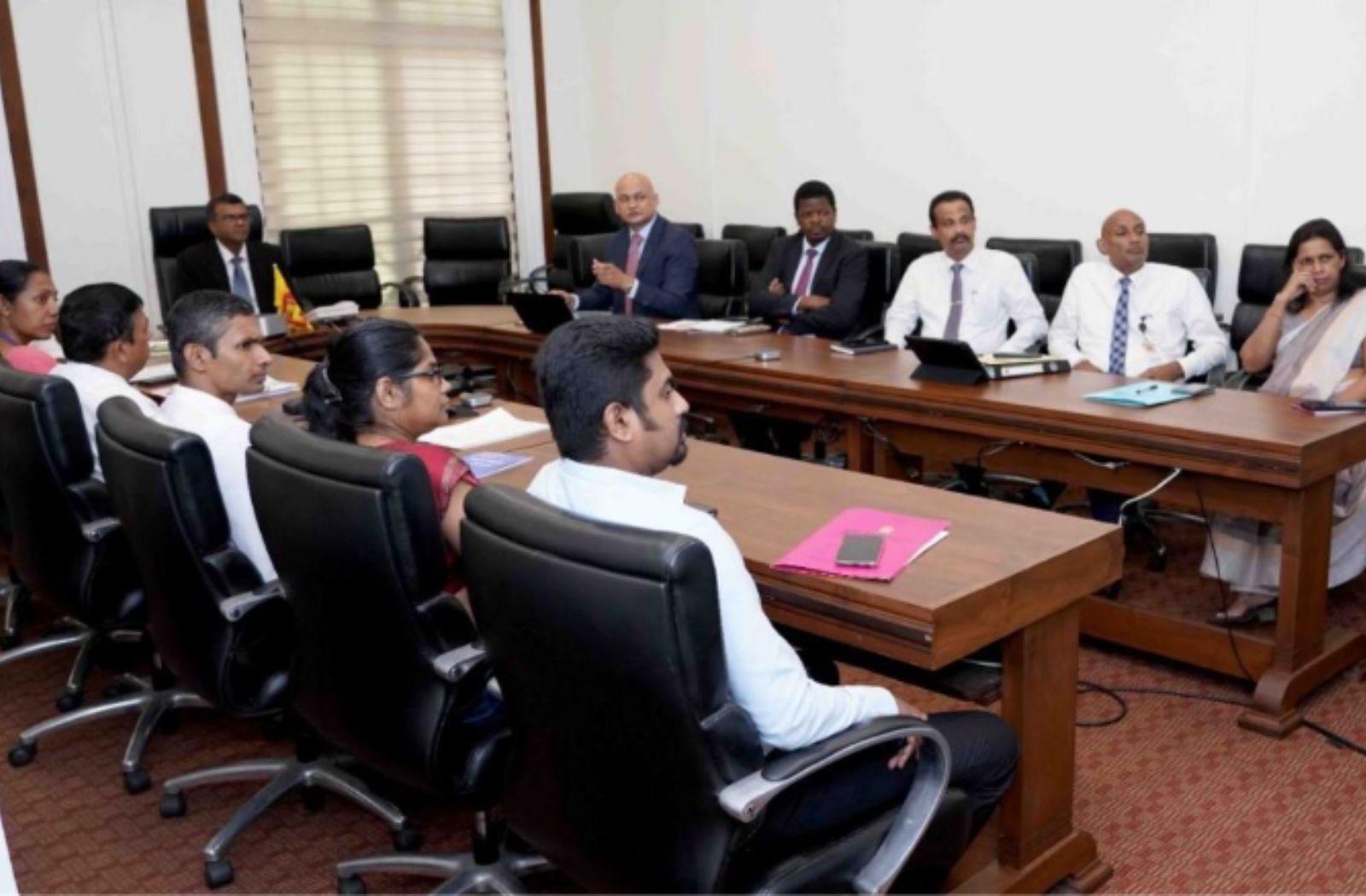 Sri Lankan government officials sitting around table