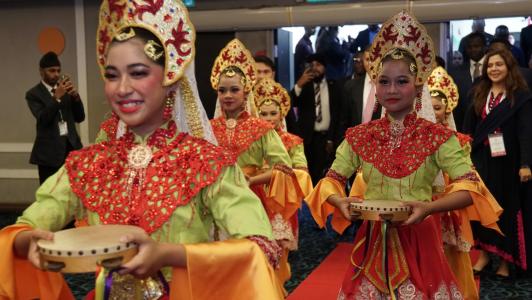 dancers in traditional dress at the Global Youth Work Conference 2025 opening ceremony 