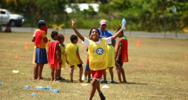 young girl playing sports